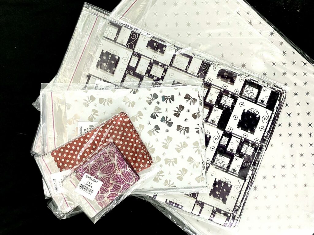 שקית אריזה למתנה 25/35 + פס דבק 100יח'